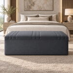 Kensington Linear Blanket Box front view in luxury bedroom with upholstered channel stitching and hidden storage design