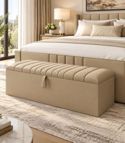 New Clarence Ottoman storage bench placed at the foot of a modern bedroom bed